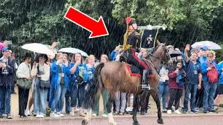 SPECIAL ROYAL GUARD GETS SOAKED OUTSIDE BUCKINGHAM PALACE