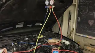 performing vacuum test for LEAKS on an air-conditioning system