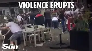 Moment fans launch chairs in bloody clash ahead of Euros match