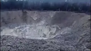 Massive Crater Caused by Russian Missile Intercepted Near Kyiv