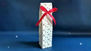 How to wrap a bottle as gift with wrapping paper | Gift wrapping ideas for wine bottle