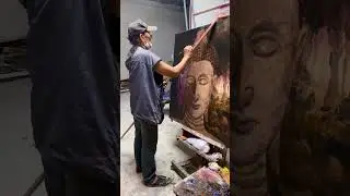 Unusual art: how street masterpieces are born. Artist painting buddha 