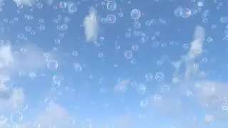 Rising Shiny Irridescent Soap Bubbles Floating Upward Into The Sky 4K Video Effects HD Background