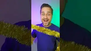 Christmas tinsel through neck 🎅🎄 Magic Trick TUTORIAL 🪄