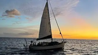 Sailing alone overnight to Kauai and escaping huge swell