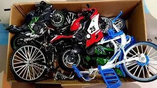 Box with bikes and motorcycles | evolution of bicycles and motorcycles