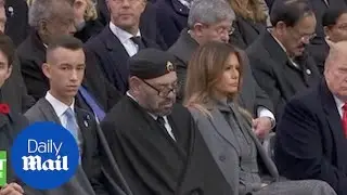 Donald Trump stares at King of Morocco during Armistice event