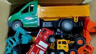 Cars for children. A construction vehicle, an excavator, a Kamaz truck and several more vehicles.