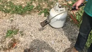 killing weeds with “FIRE” (propane weed burning torch)