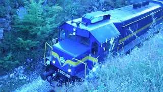 2 x EMD G26C at full throttle passing by Croatian famous National park Plitvice lakes.