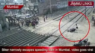 Biker narrowly escapes speeding train in Mumbai, video goes viral